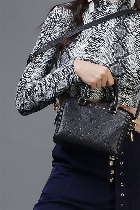 lv speedy black handle|Products by Louis Vuitton: Speedy Bandoulière 20 Bag.